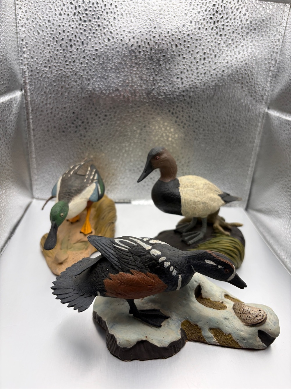 Set of three duck figurines. Vintage molded resin. Great condition